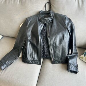 Like new condition, black genuine leather jacket. Size xs. Hennes collection.